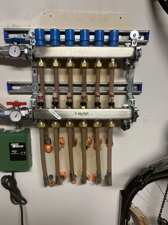 Plumber performing Gas Line Installation at a residential property in Macon-Bibb County