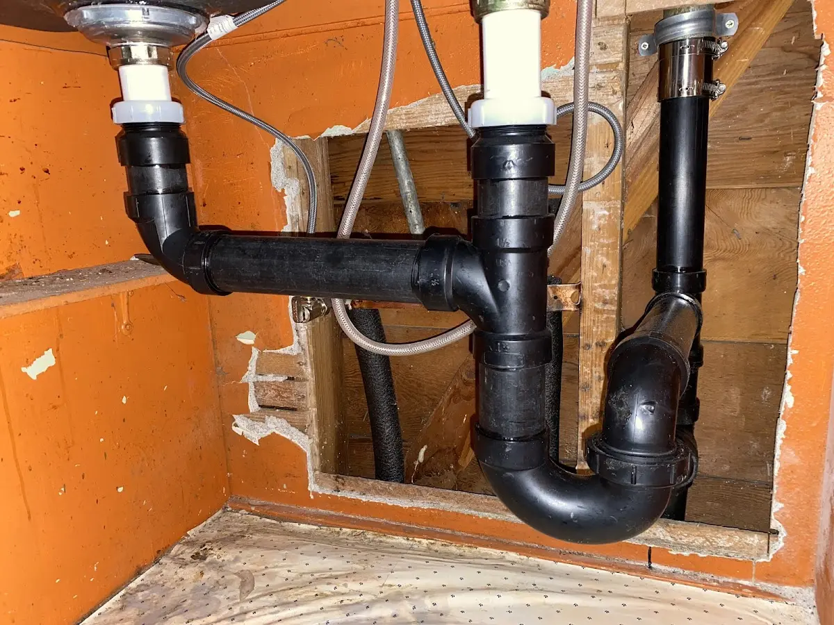 Professional Garbage Disposal Repair equipment and tools on the job in Macon-Bibb County